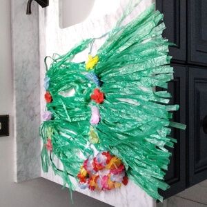 Retired Green Hawaiian Grass Skirts with Floral Accents for American Girl doll.